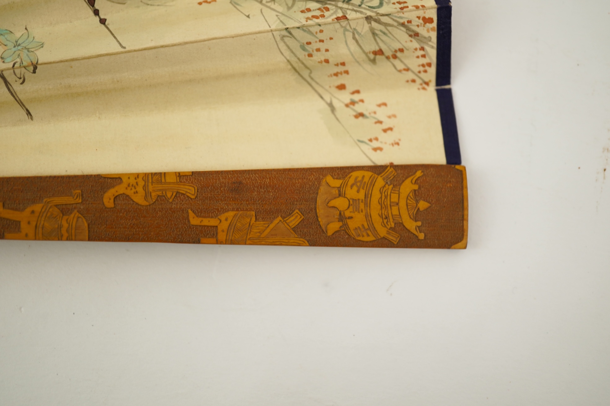 Two Chinese inscribed paper leaf fans, late 19th century